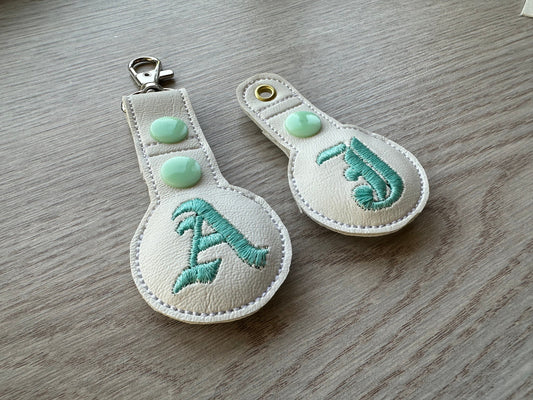 Old English Monogram Airtag Cover