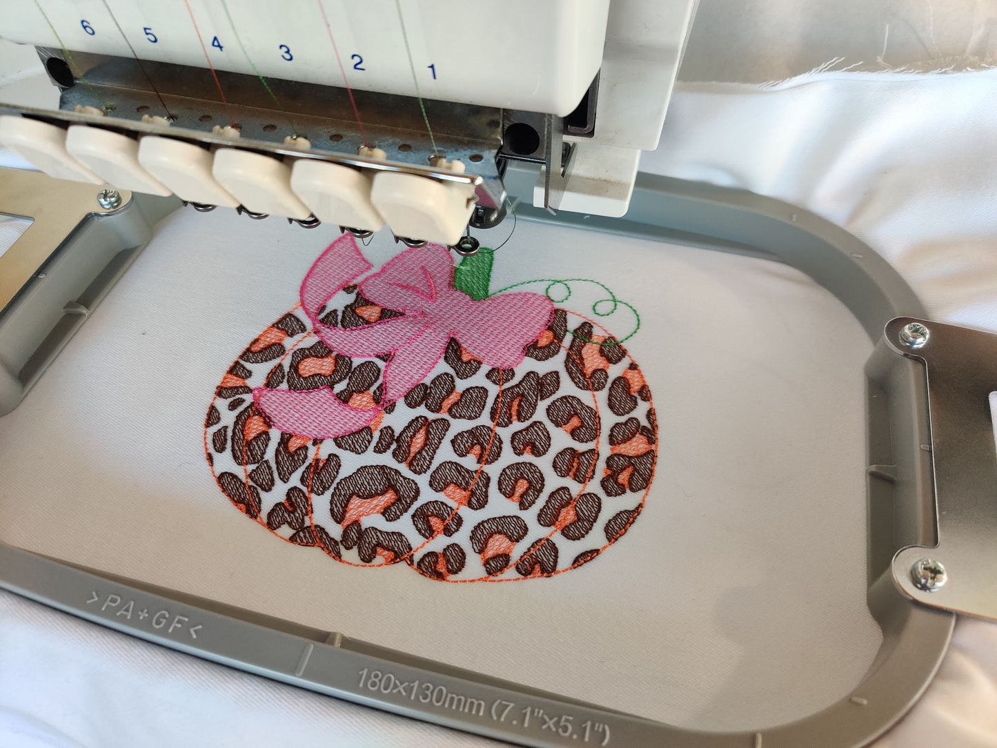 Leopard Pumpkin with Bow – Fall machine embroidery design by Artapli