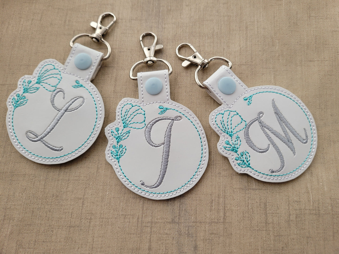 Floral Frame Monogram Keychain ITH – In-the-Hoop embroidery design instant download by Artapli