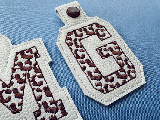 Leopard print Monogram Eyelet and Key Fob Snap Tab Block Font alphabet in the hoop ITH machine embroidery designs keychain bag tag gift idea