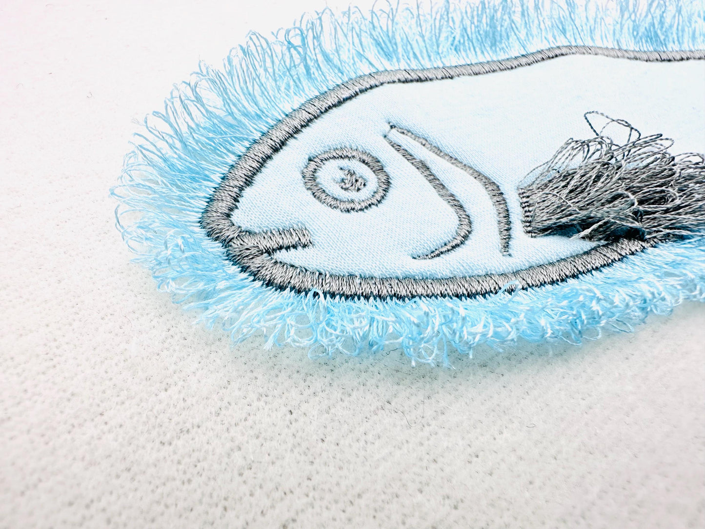 Fluffy Fringed Fish – Marine digital embroidery pattern by Artapli