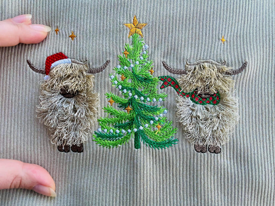 Fringed Highland Cow with Christmas Tree