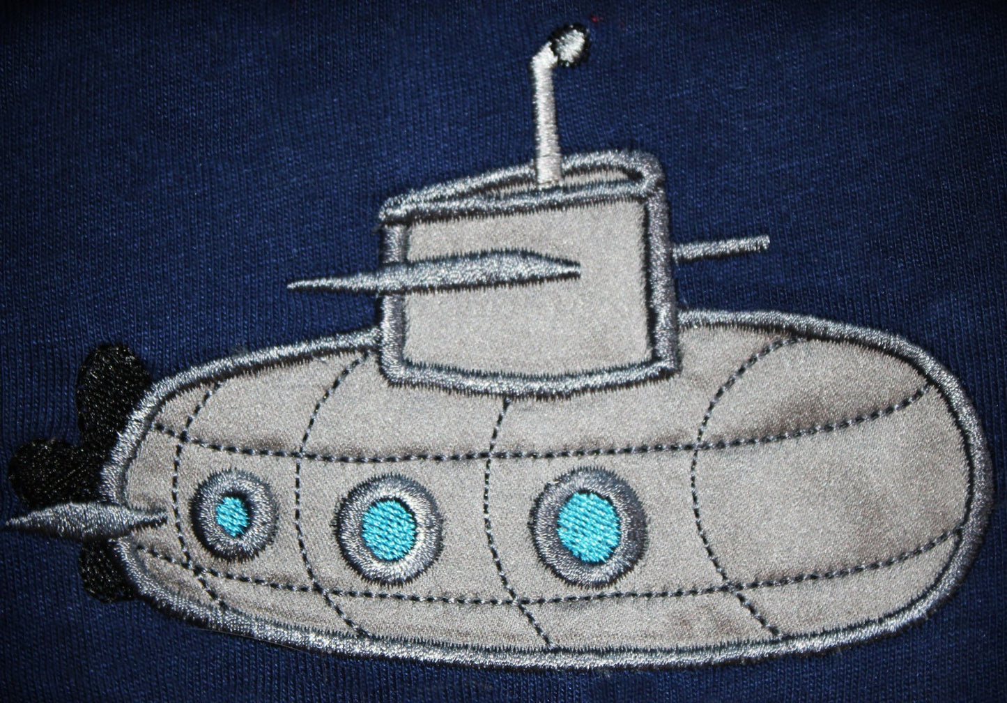 Submarine machine embroidery applique and filled design