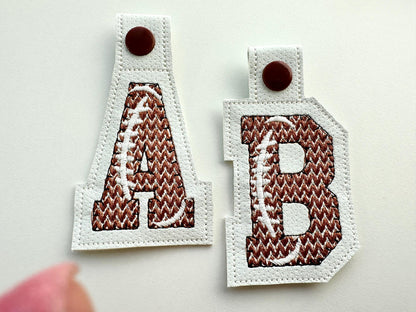 Knit stitch effect Football Eyelet and Key Fob Snap Tab Block sport