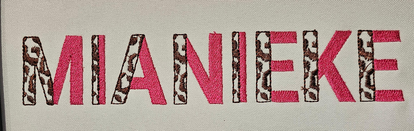 Leopard Spots and Fill Stitch Duotone Split Font