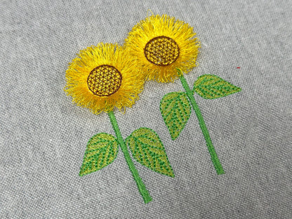 Two Fringed Sunflower Stems in a row