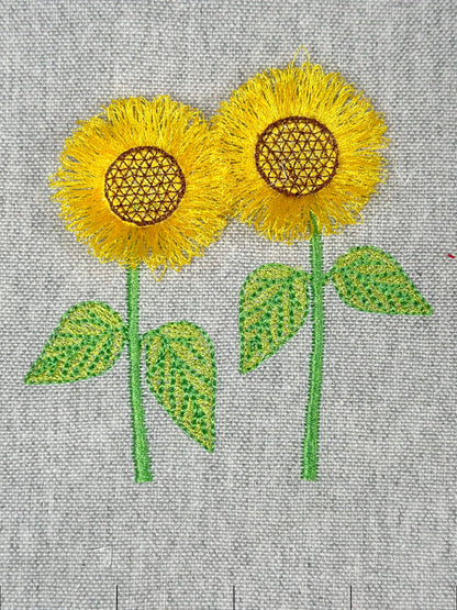 Two Fringed Sunflower Stems in a row