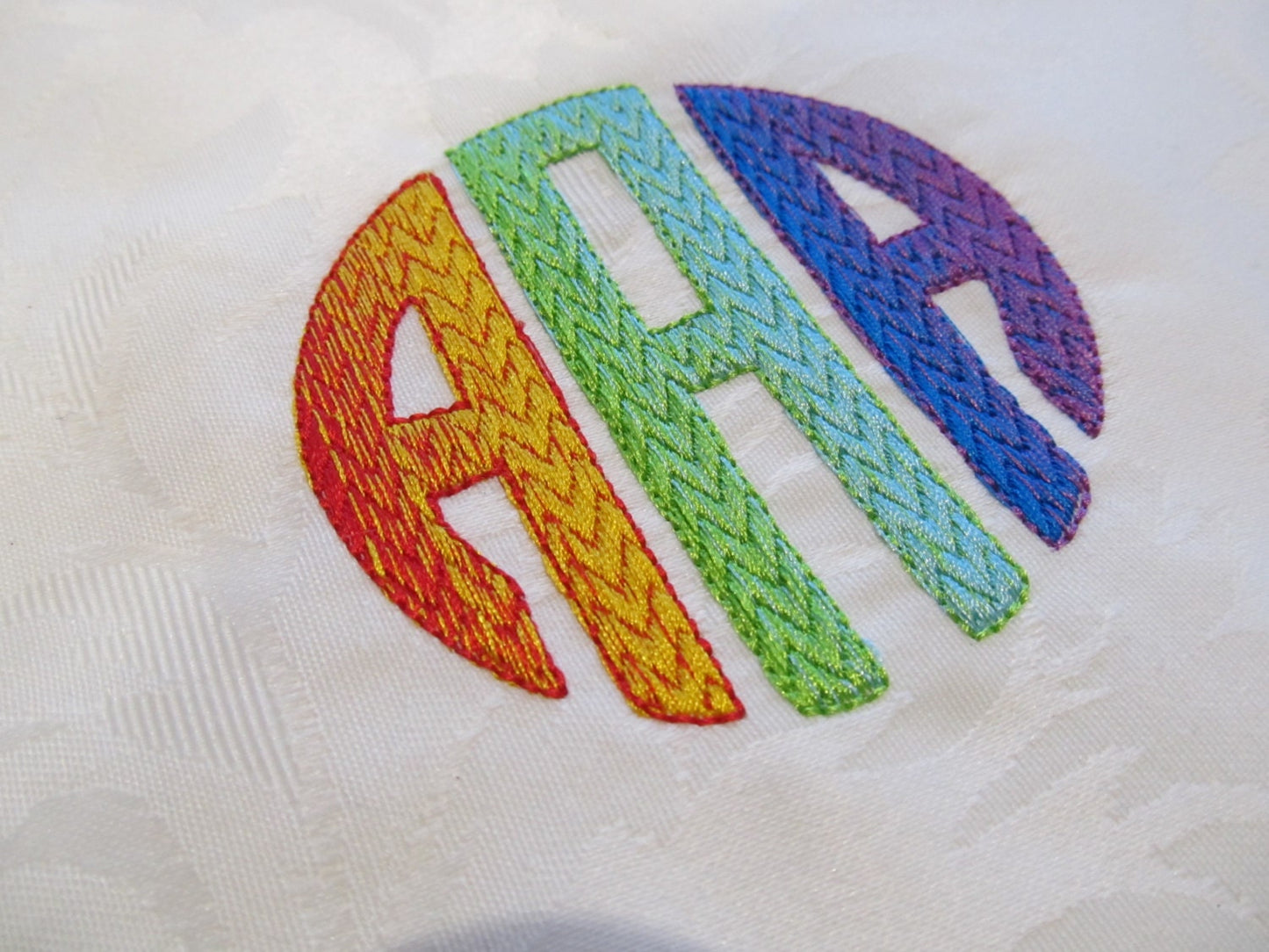 Iridescent Chevron Circle Monogram Font