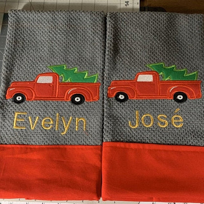 Station wagon with Christmas gifts in gingham plaid wrap Truck with