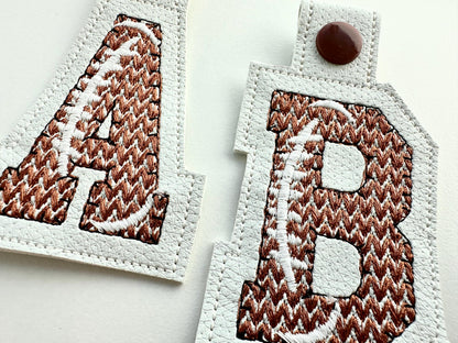 Knit stitch effect Football Eyelet and Key Fob Snap Tab Block sport