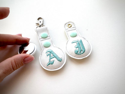 Old English Monogram Airtag Cover