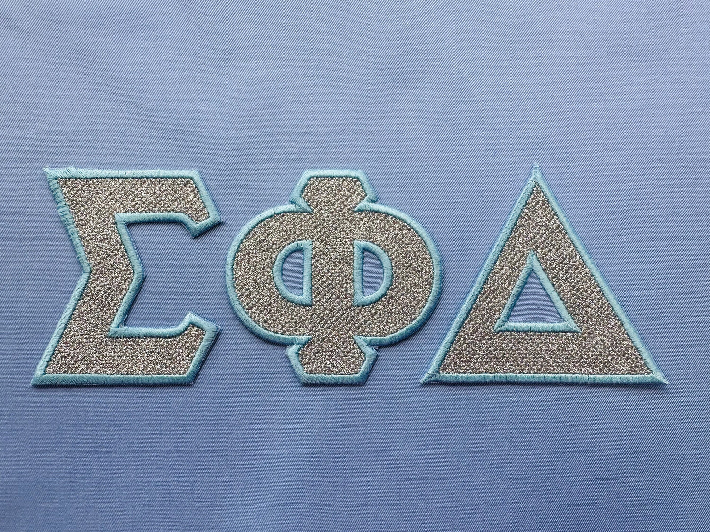 Glitter Greek Font light stitch diamonds and satin stitch outline