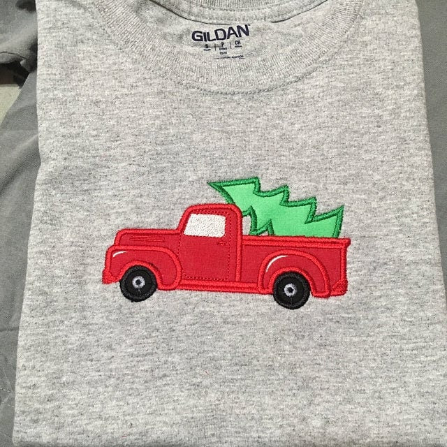 Station wagon with Christmas Gingham plaid gnomes Truck with trees in