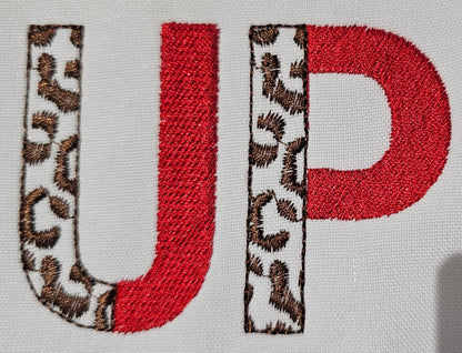 Leopard Spots and Fill Stitch Duotone Split Font