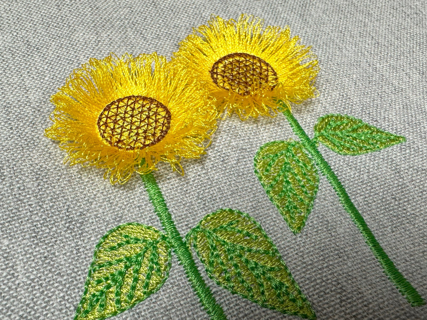 Two Fringed Sunflower Stems in a row