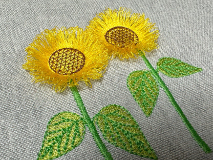 Two Fringed Sunflower Stems in a row