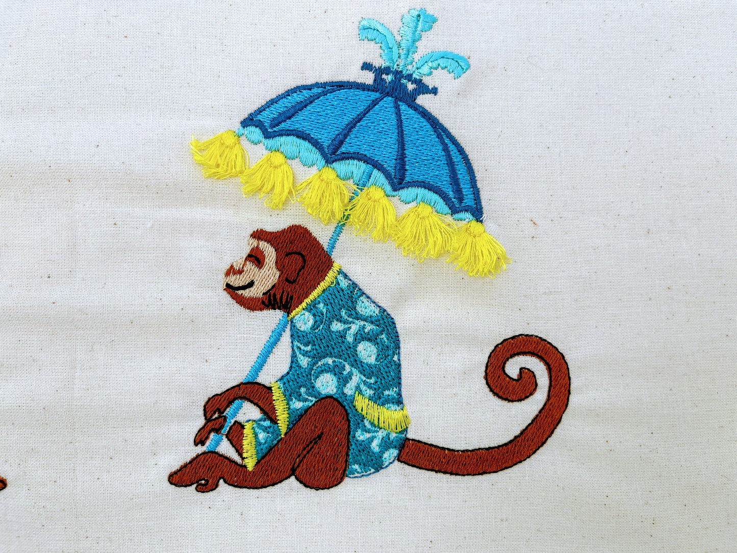 Summer vacation Monkey sun umbrella taking sunbath in the hoop fringed
