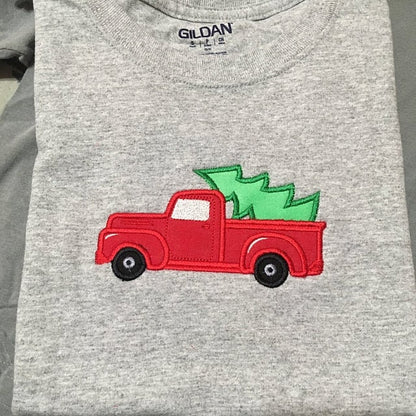 Station wagon with Christmas gifts in gingham plaid wrap Truck with