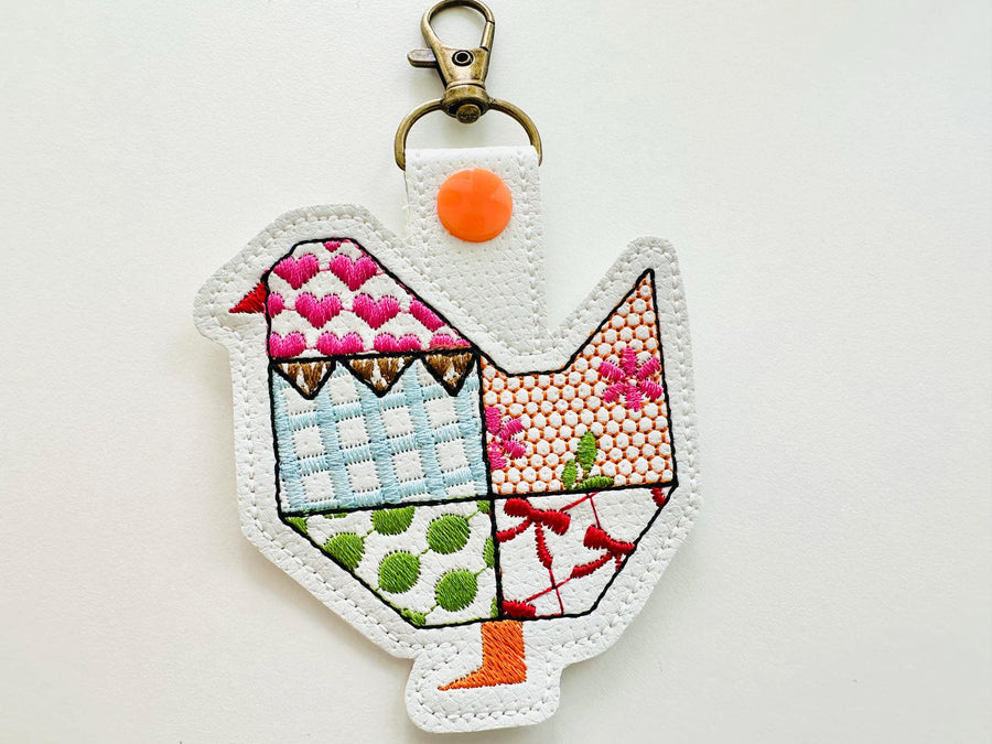 Patchwork Folk Chicken 2 types Eyelet and Key Fob snap tab ITH in the