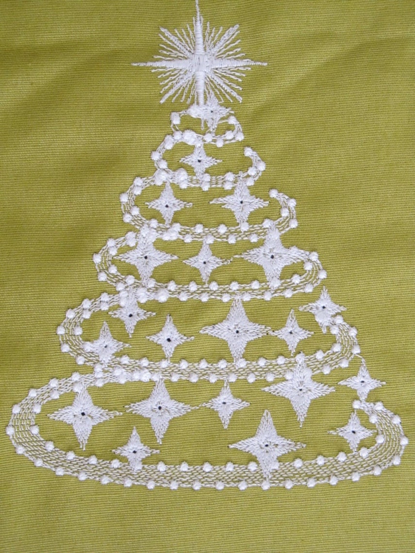 Sparkling and glowing Christmas tree, swirl and curl glow in the dark