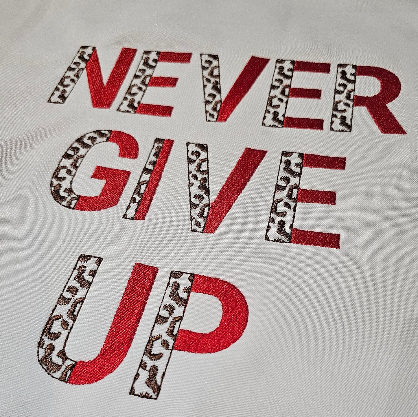 Leopard Spots and Fill Stitch Duotone Split Font