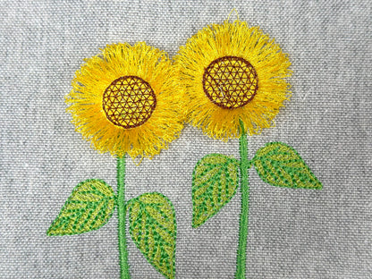 Two Fringed Sunflower Stems in a row