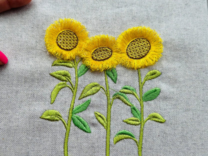 Three Fringed Sunflower Stems in a row
