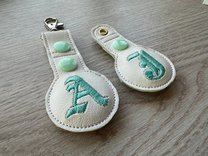 Old English Monogram Airtag Cover