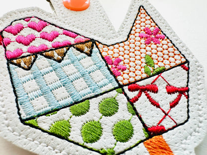 Patchwork Folk Chicken 2 types Eyelet and Key Fob snap tab ITH in the