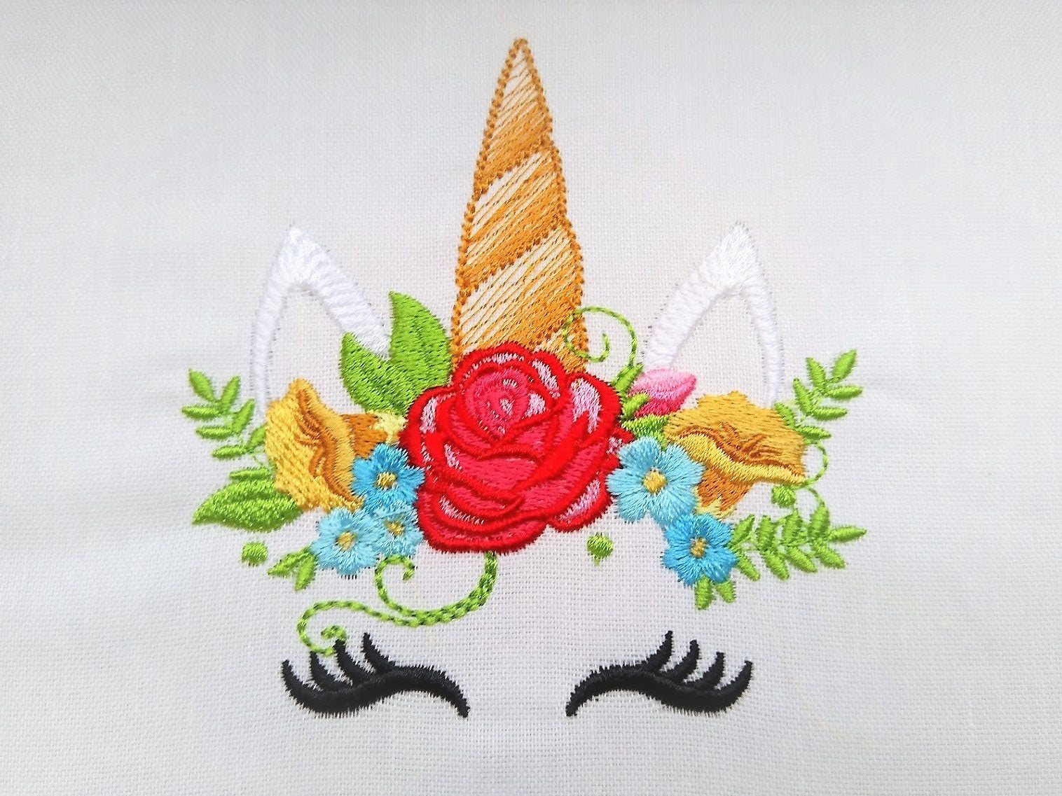 Unicorn pretty eyes with shabby chic rose crown floral bouquet fill stitch machine embroidery designs