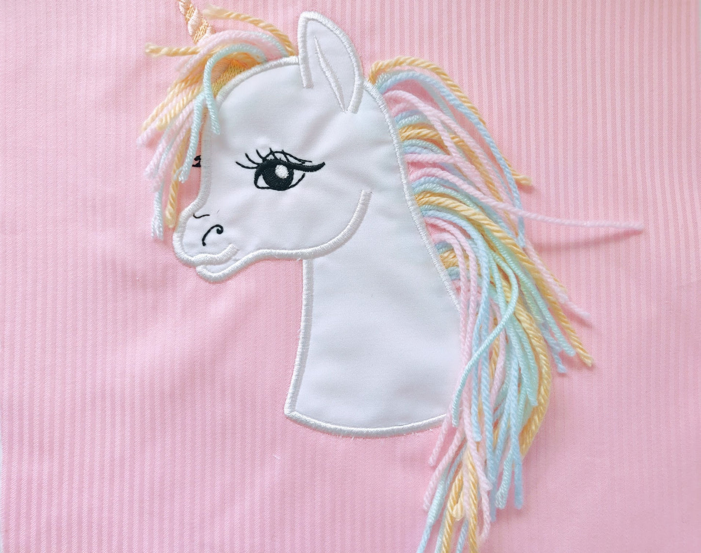 Little Unicorn applique with yarn hair in the hoop machine embroidery designs ITH
