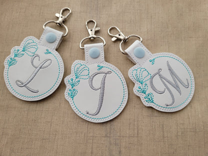 Floral Frame Monogram Keychain ITH – In-the-Hoop embroidery design instant download by Artapli
