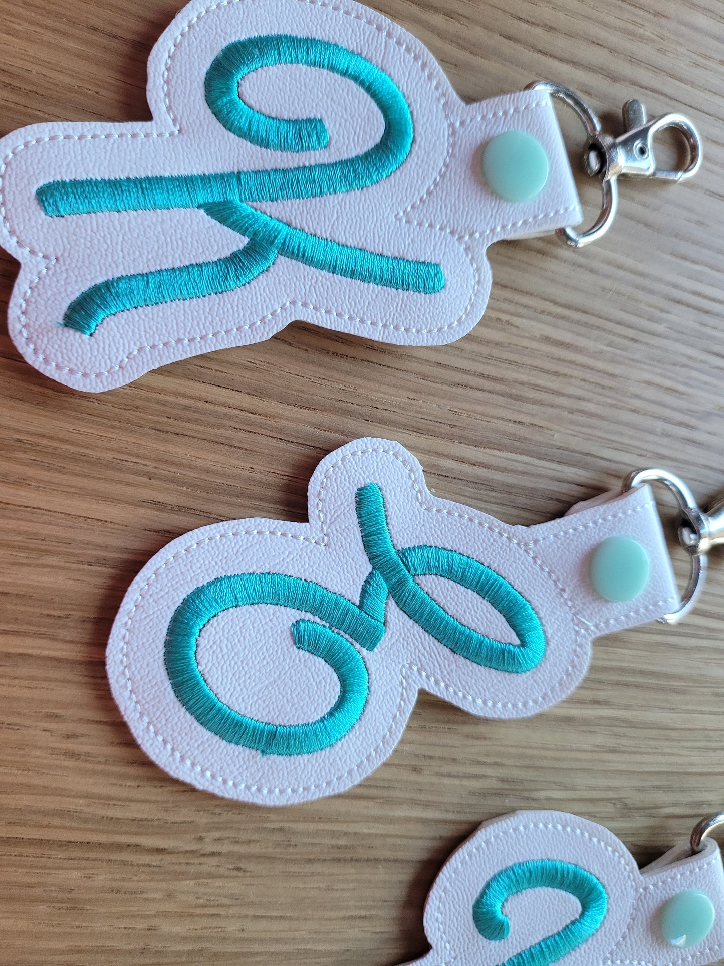 Key fob snap tab Monogram script initial letters from A up to Z in the hoop ITH keyfob bag tag keychain machine embroidery designs