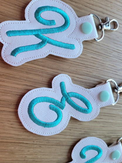 Key fob snap tab Monogram script initial letters from A up to Z in the hoop ITH keyfob bag tag keychain machine embroidery designs