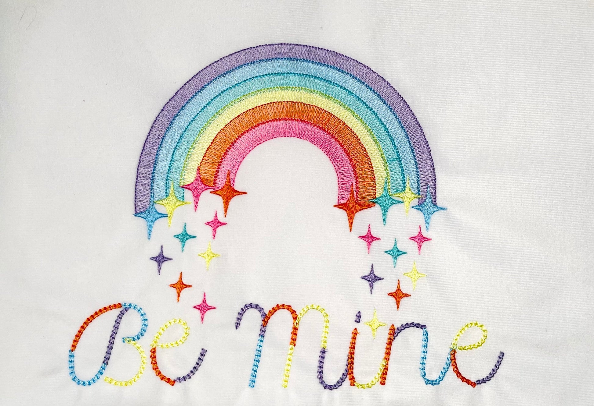 Light stitch rainbow with falling stars starrymachine embroidery designs