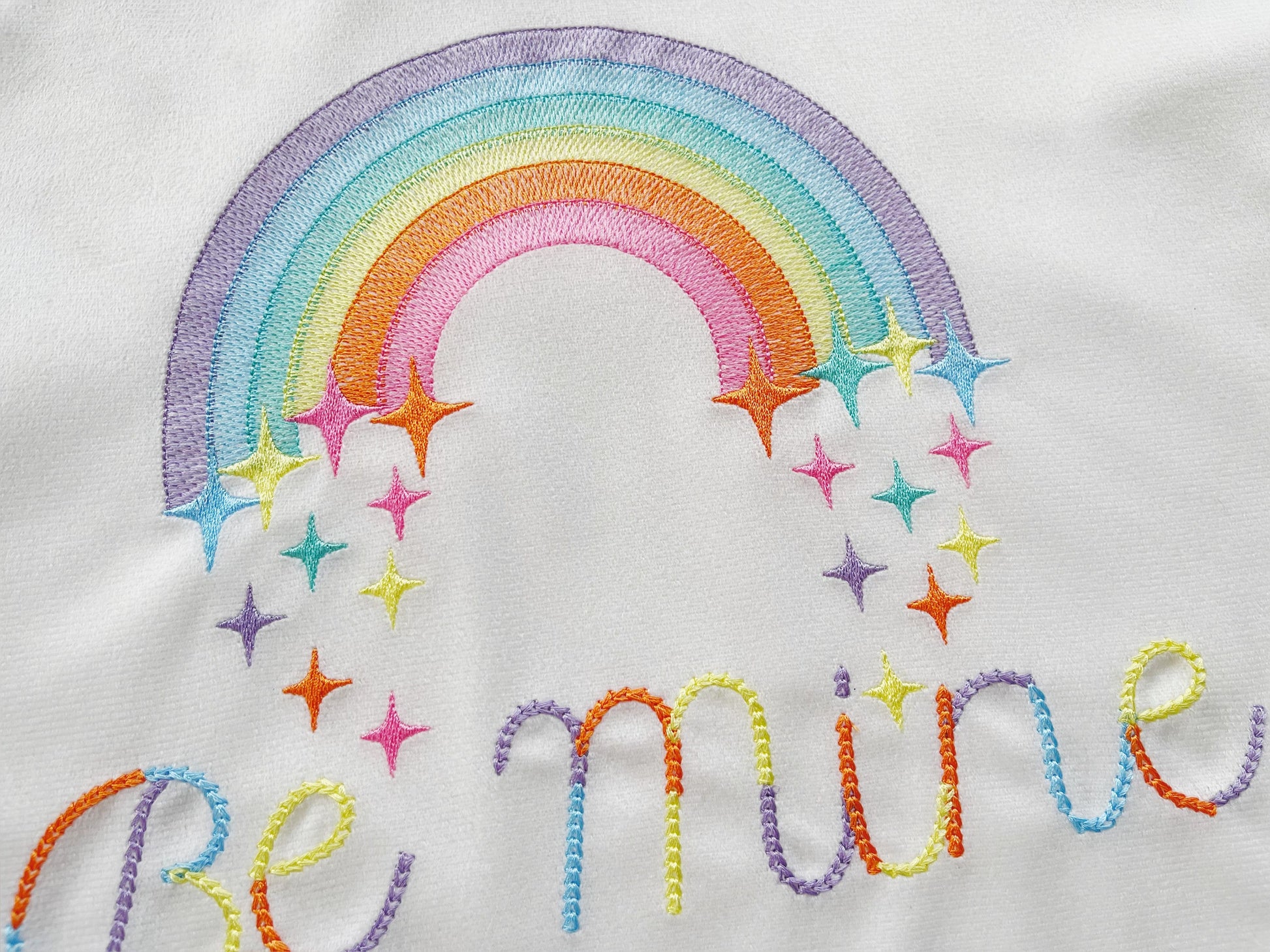 Light stitch rainbow with falling stars starrymachine embroidery designs
