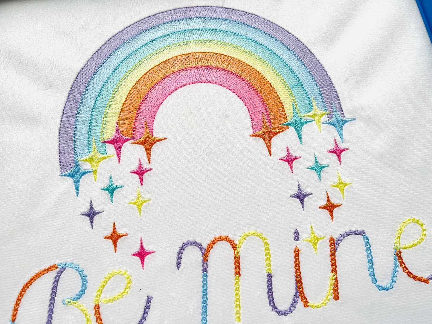 Light stitch rainbow with falling stars starrymachine embroidery designs