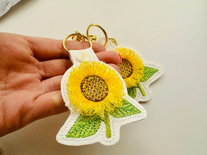 Sunflower key fob snap tab and eyelet sunflower keychain in the hoop machine embroidery designs ITH project flower fluffy fuzzy sunflower