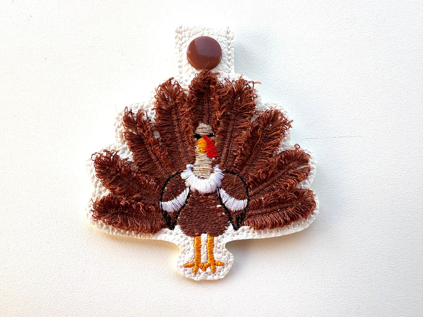Fringed Turkey eyelet and key fob snap tab in the hoop machine embroidery designs ITH keychain Awesome fluffy fur Thanksgiving backpack tag