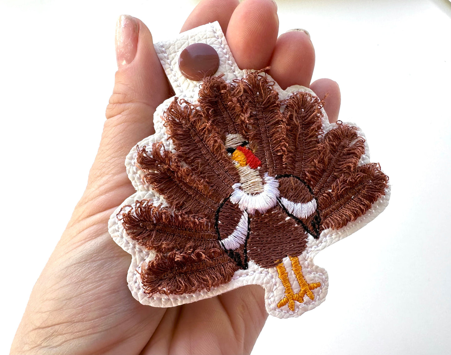 Fringed Turkey eyelet and key fob snap tab in the hoop machine embroidery designs ITH keychain Awesome fluffy fur Thanksgiving backpack tag