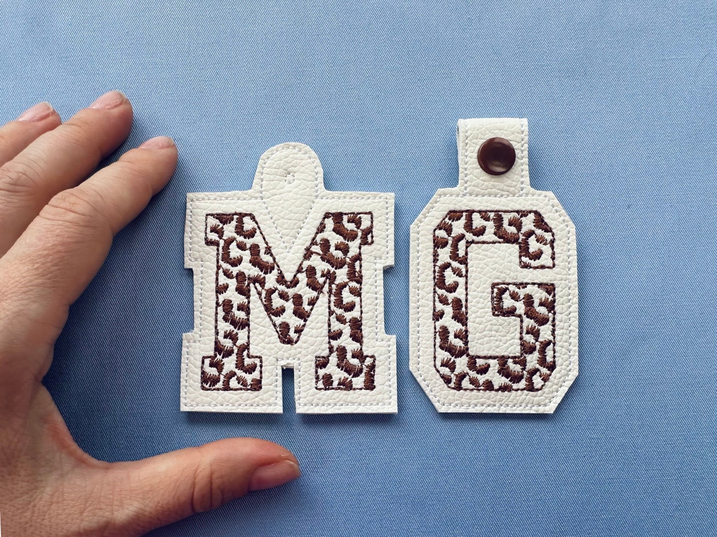 Leopard print Monogram Eyelet and Key Fob Snap Tab Block Font alphabet in the hoop ITH machine embroidery designs keychain bag tag gift idea