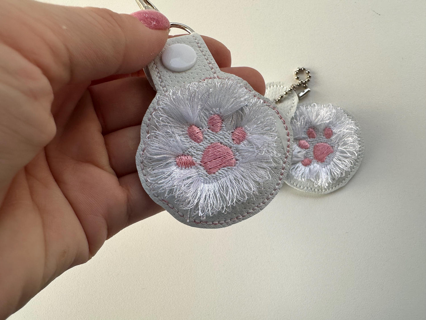 Fringed Cat Kitty Paw Eyelet and Key Fob Snap Tab in the hoop machine embroidery designs ITH project key ring keychain fluffy fur cute Paw