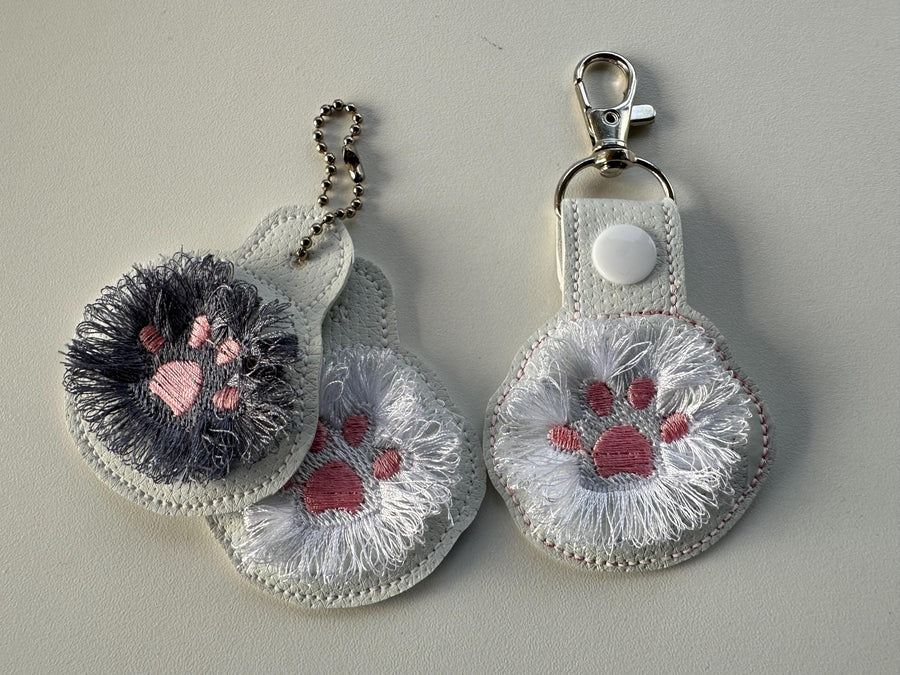Fringed Cat Kitty Paw Eyelet and Key Fob Snap Tab in the hoop machine embroidery designs ITH project key ring keychain fluffy fur cute Paw