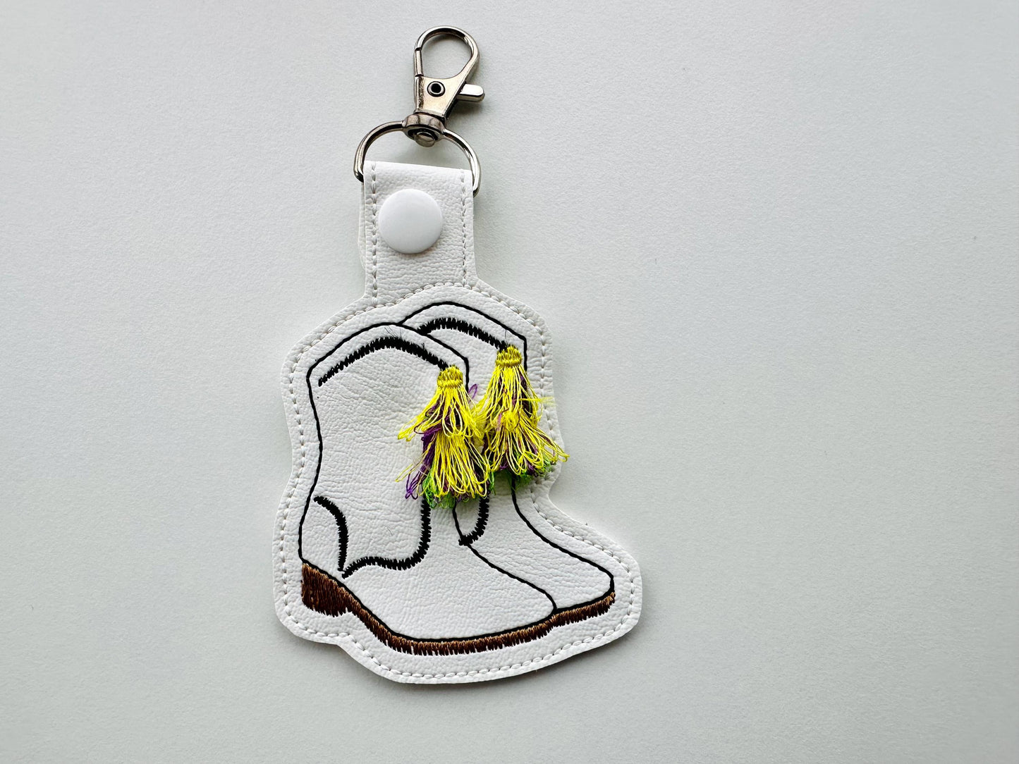Mardi Gras festive Boots fringed tassels Eyelet and Key Fob Snap Tab keychain in the hoop machine embroidery design
