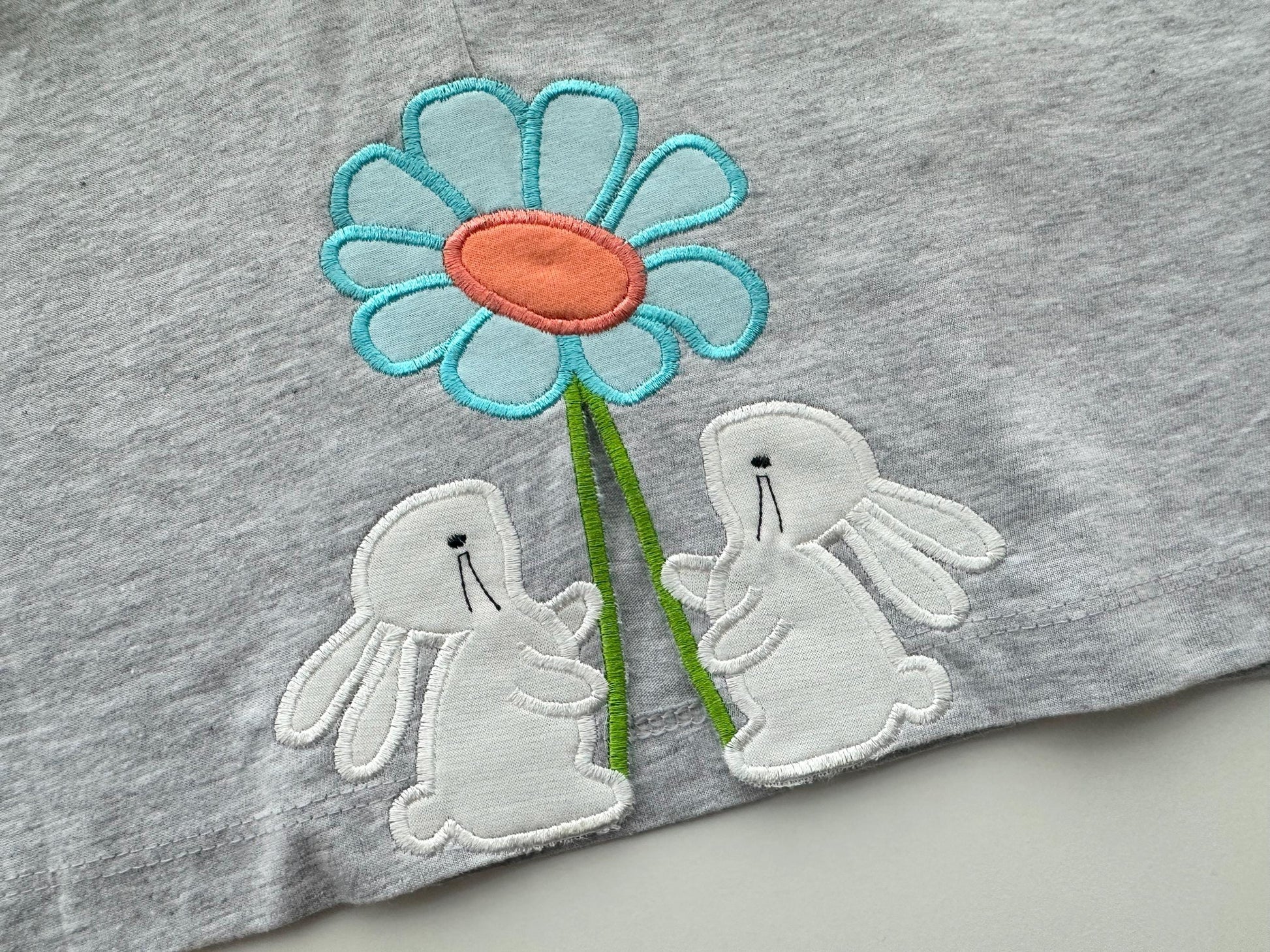 Cute little Easter Bunnies with Flower side split seam cutout side bow Applique machine embroidery design