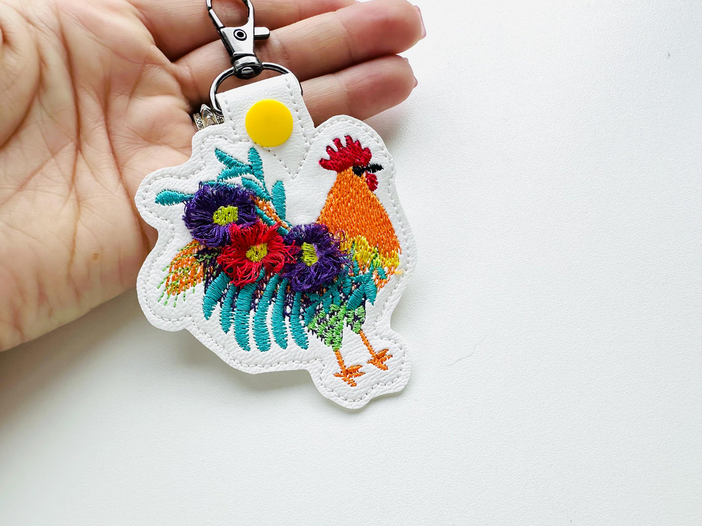 Floral Rooster Eyelet and Key Fob Snap Tab fringed fluffy keychain in the hoop ITH machine embroidery design