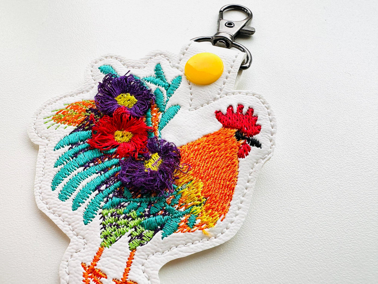 Floral Rooster Eyelet and Key Fob Snap Tab fringed fluffy keychain in the hoop ITH machine embroidery design
