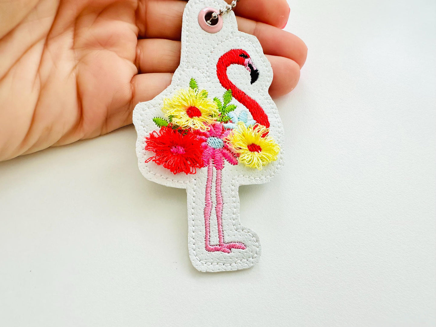 Fringed floral Flamingo Eyelet and key fob snap tab in the hoop machine embroidery designs pretty bird ITH project kids girls keychain tag