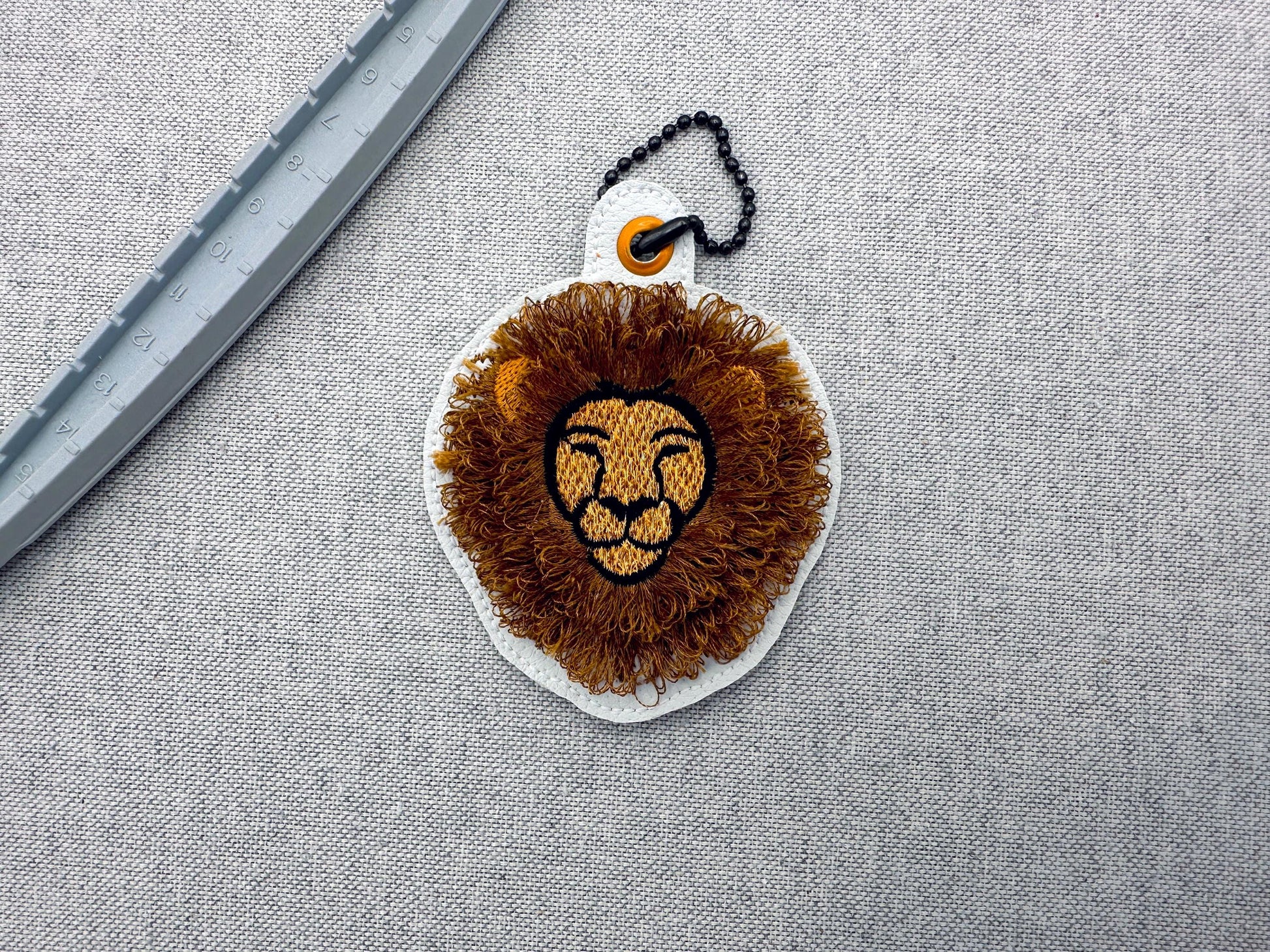 Fringed Fluffy Lion Eyelet and Key Fob Snap Tab in the hoop machine embroidery designs ITH keychain bag tag kids boys gift idea