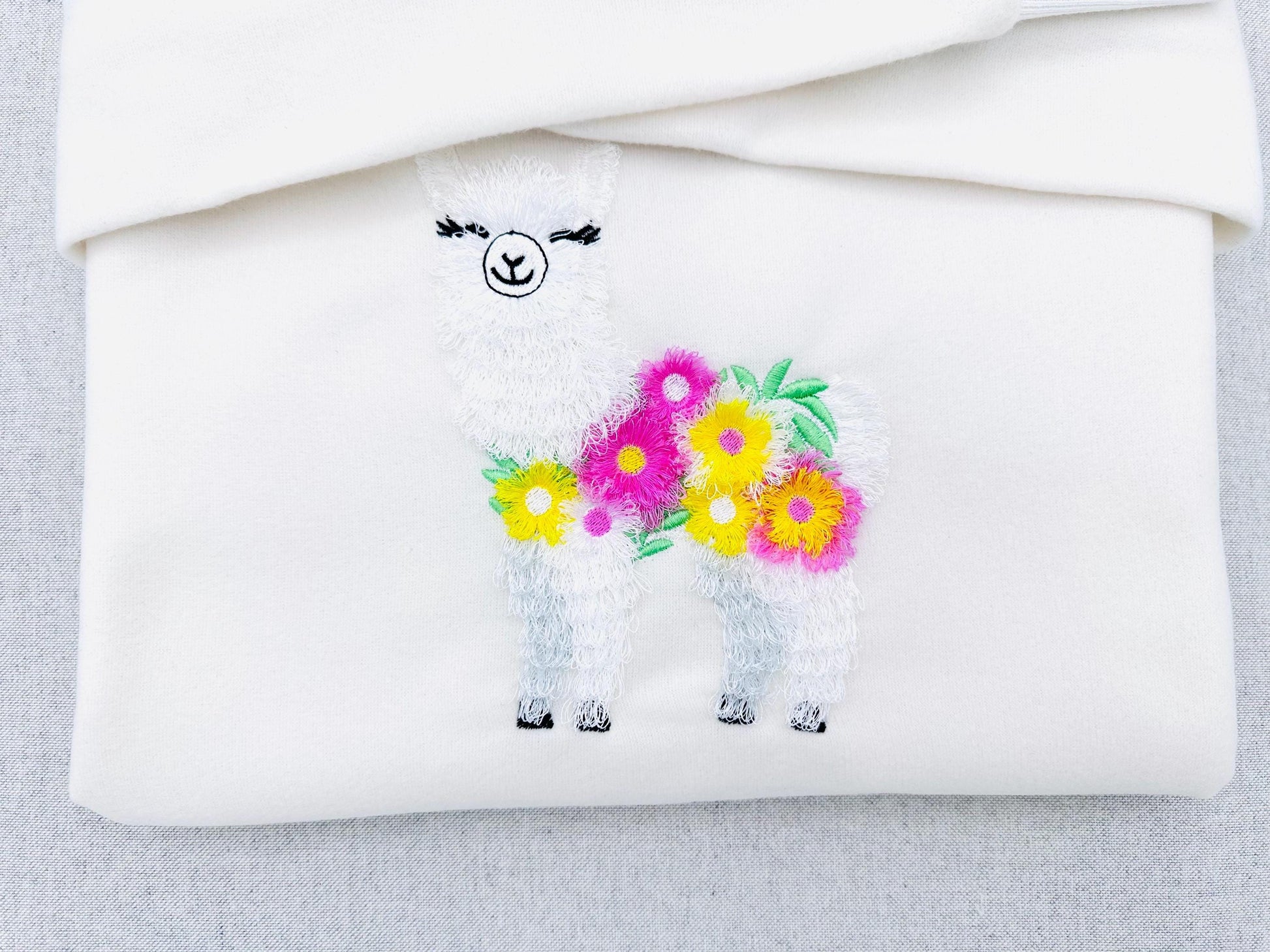 Fringed Floral Pretty Llama – Floral machine embroidery pattern by Artapli